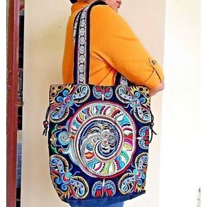 Multi-colored flowers embroidered fabric backpack