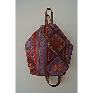 Tapestry patterned fastener backpack